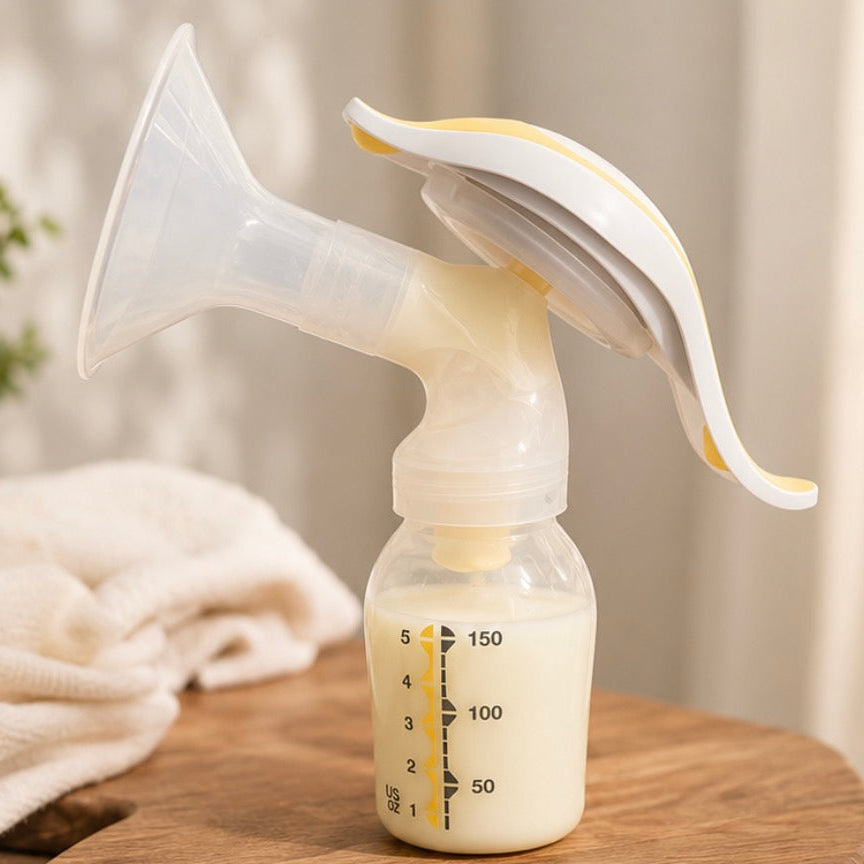 Extractor manual de leche materna con frasco medidor - curso Domina tu Extracción de Leche